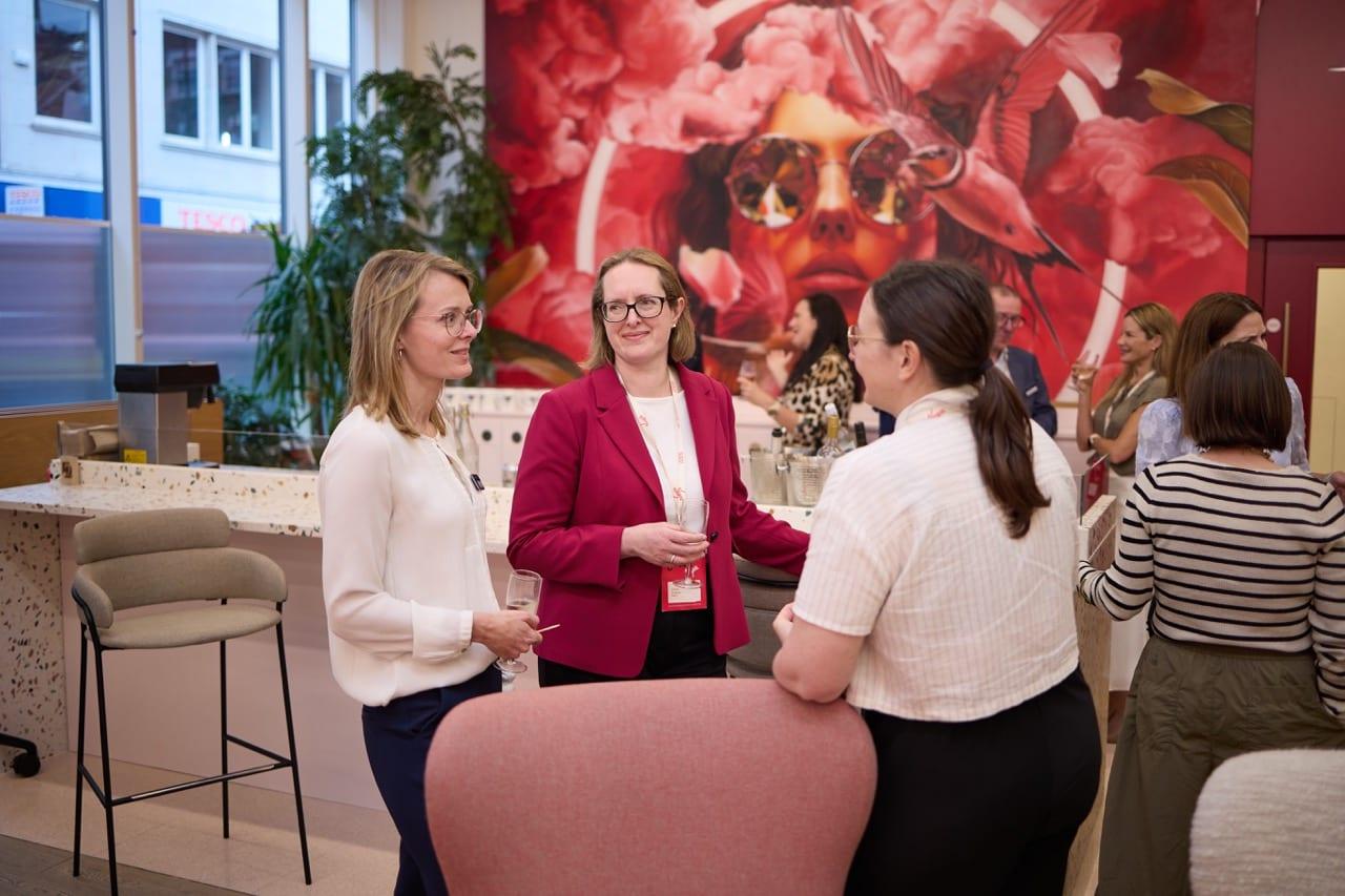 Delegates talking between sessions at an Optimal People event